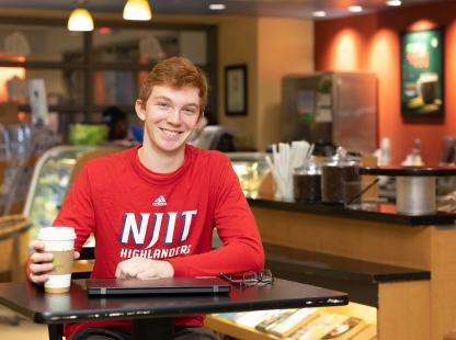 Photo of student in the cafe